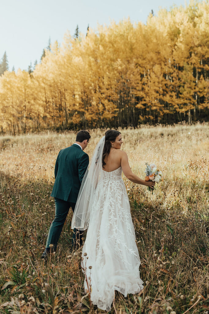 Bride and groom portraits in the Colorado fall foliage 