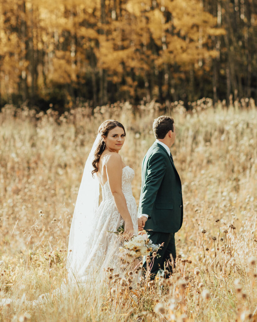 Bride and groom portraits in the Colorado fall foliage 