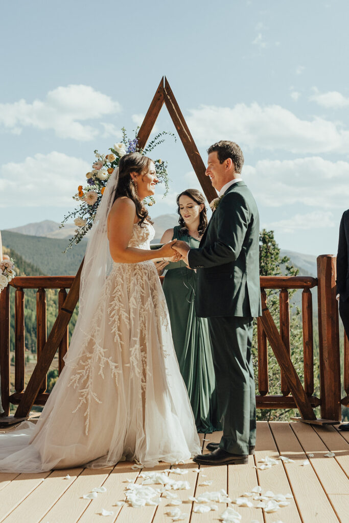 A Lodge at Breckenridge wedding ceremony with mountain views
