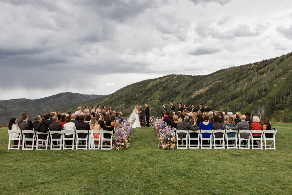 Steamboat, Colorado mountain wedding ceremony with colorful floral installations