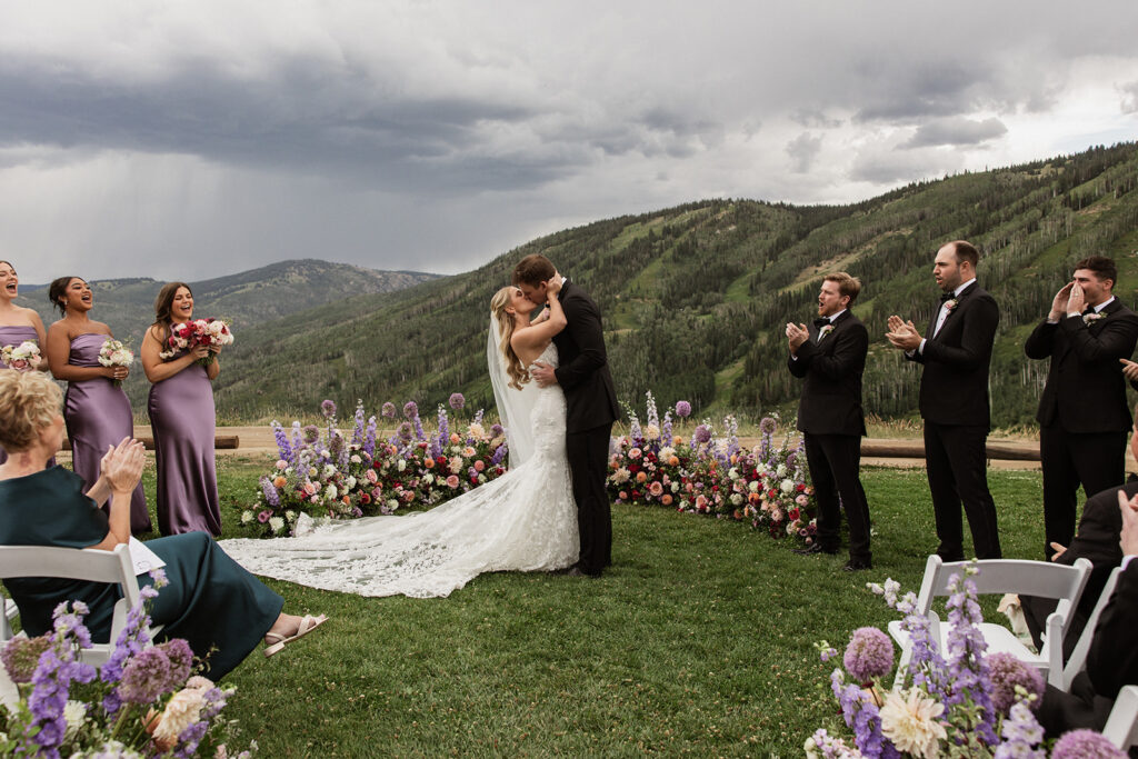Steamboat, Colorado mountain wedding ceremony with colorful floral installations