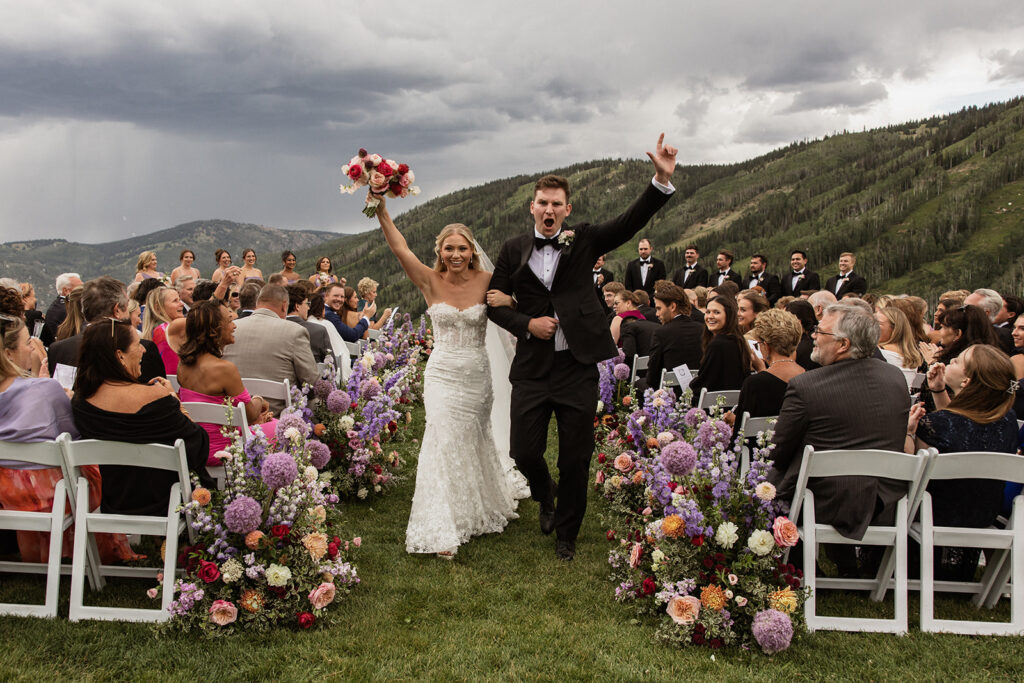Steamboat, Colorado mountain wedding ceremony with colorful floral installations