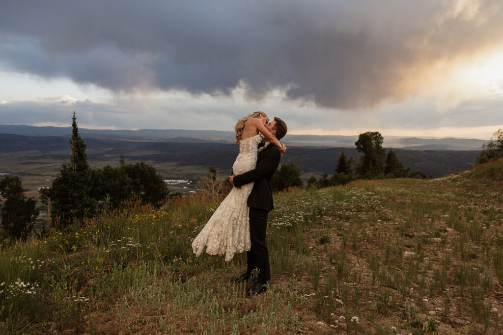 Stormy sunset bride and groom portraits in Colorado