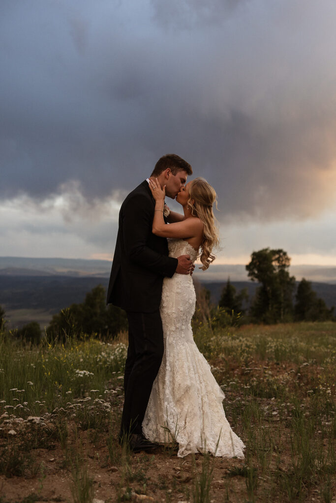 Stormy sunset bride and groom portraits in Colorado