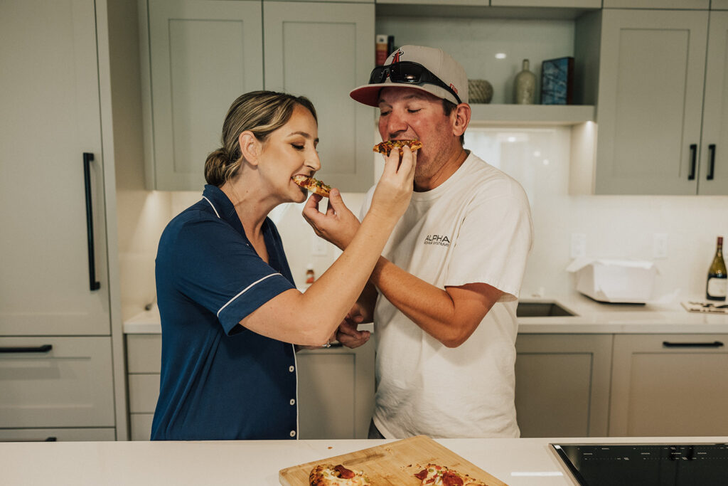 Bride and groom make pizza before their Colorado elopement ceremony