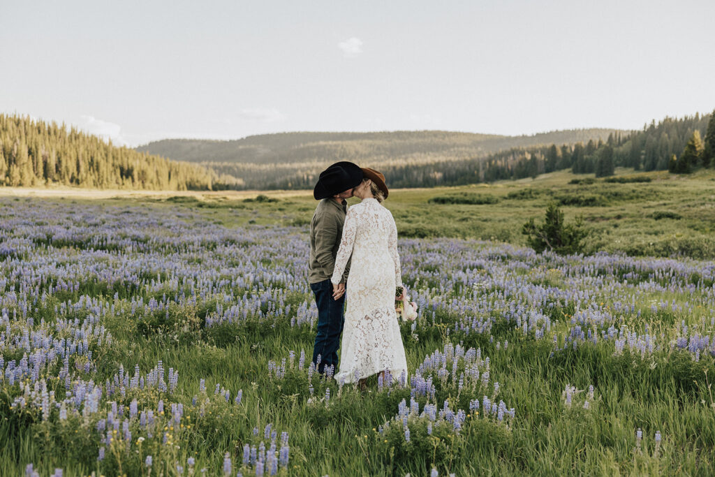 Purple wildflower elopement portraits in Steamboat Springs