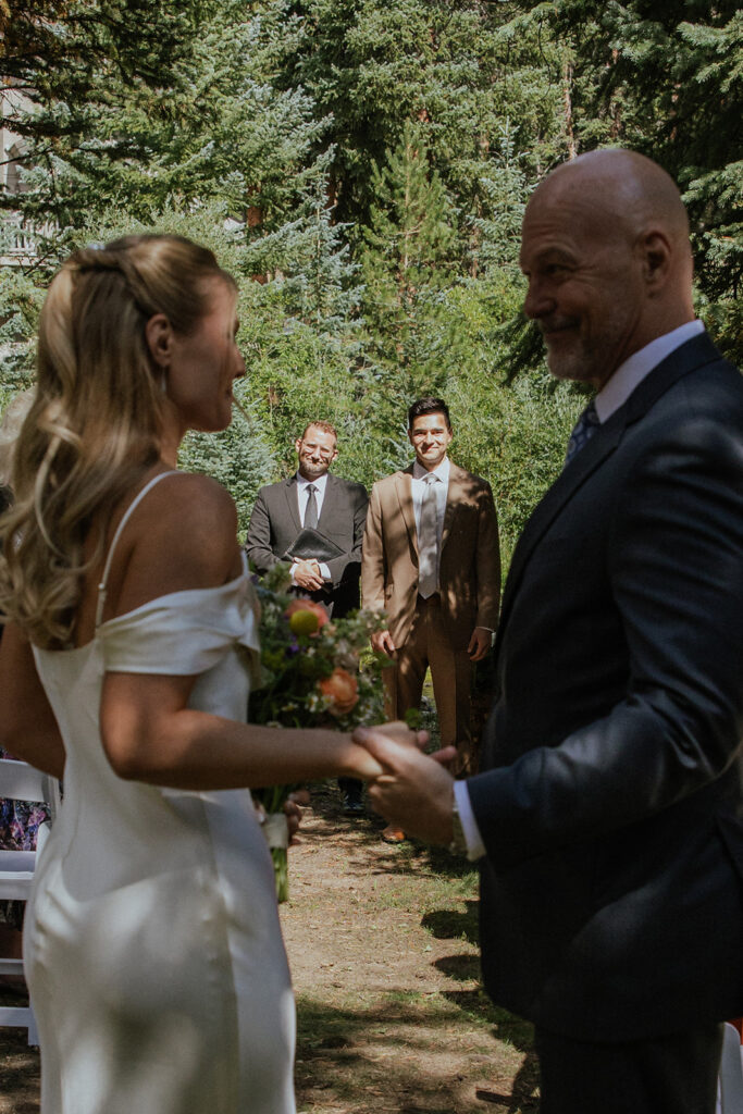Breckenridge, Colorado micro wedding ceremony in the woods by the river