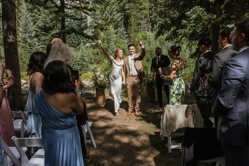 Breckenridge, Colorado micro wedding ceremony in the woods by the river