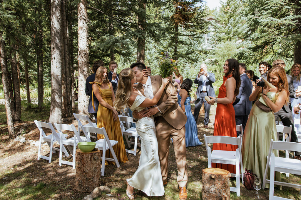 Breckenridge, Colorado micro wedding ceremony in the woods by the river