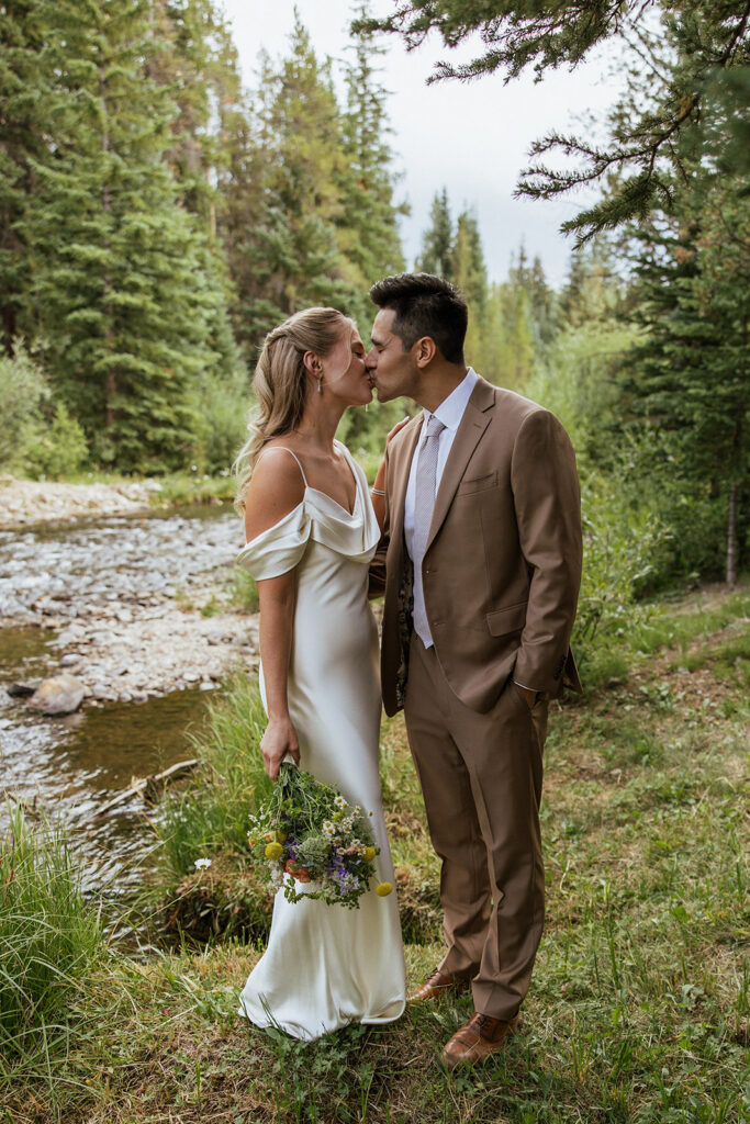 Riverside bride and groom portraits in Breckenridge