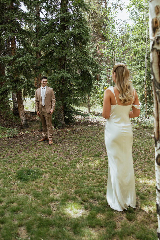 Bride and groom first look in Colorado